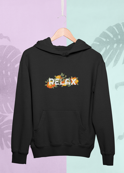 Black hoodie with 'RELAX' text and floral design on a pastel background